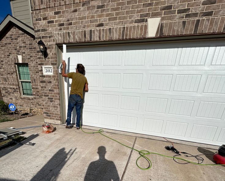 Why Professional Calibration Is Essential for Heavy Wood Garage Doors